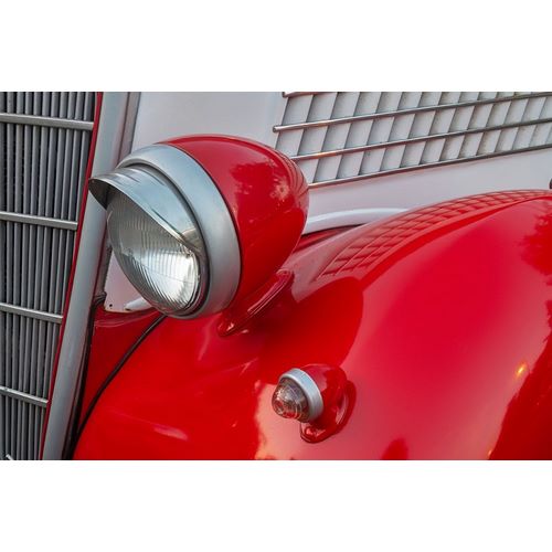 Detail of head lamp on red classic American Ford in Habana-Havana-Cuba